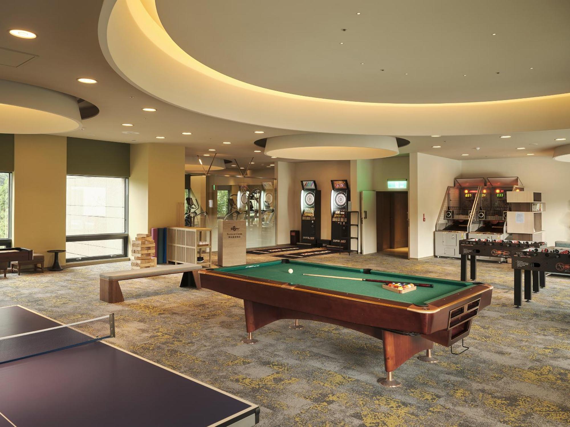 Fleur De Chine Hotel Yuchi Exterior foto The game room at the clubhouse