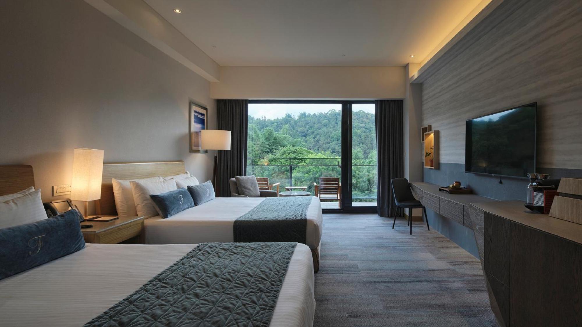 Fleur De Chine Hotel Yuchi Quarto foto Deluxe Room