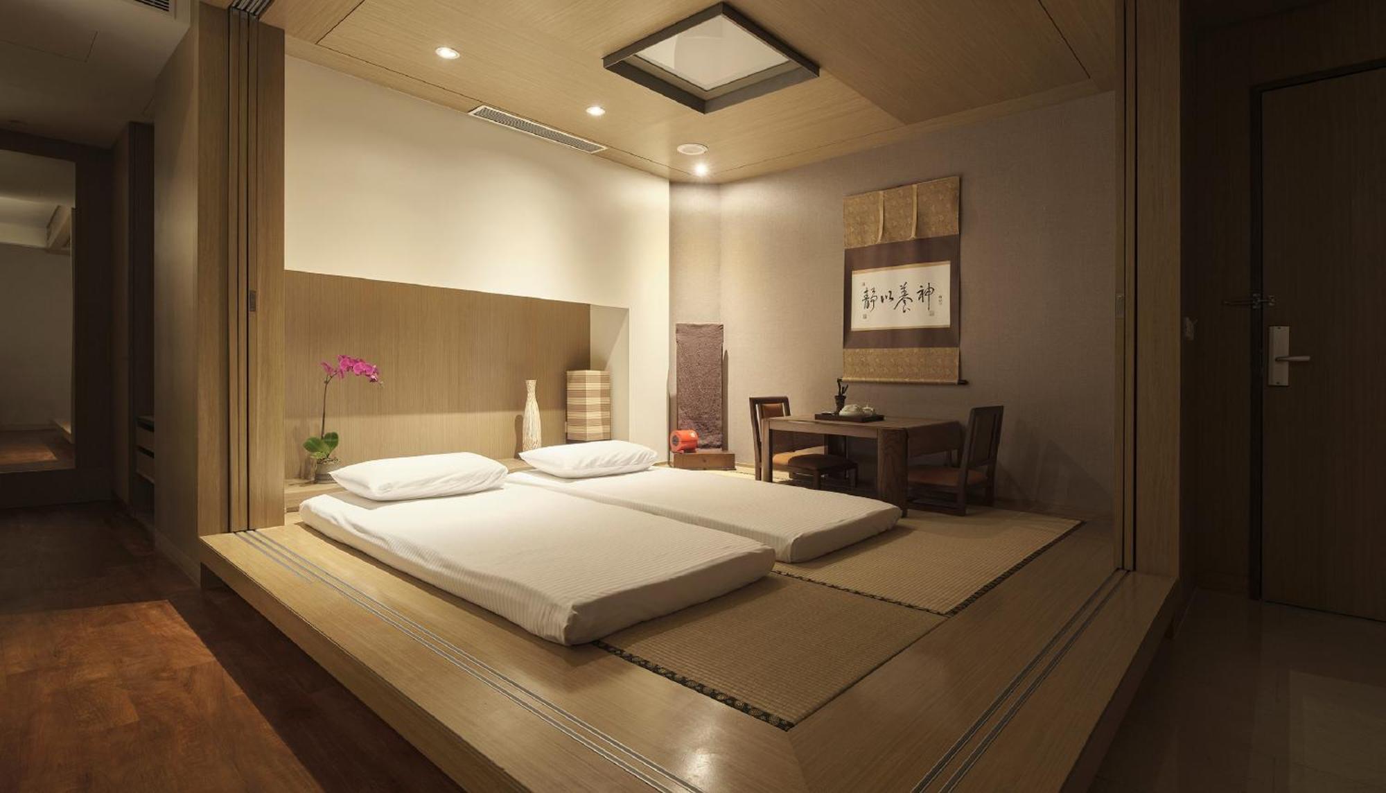 Fleur De Chine Hotel Yuchi Quarto foto A room with a tatami floor