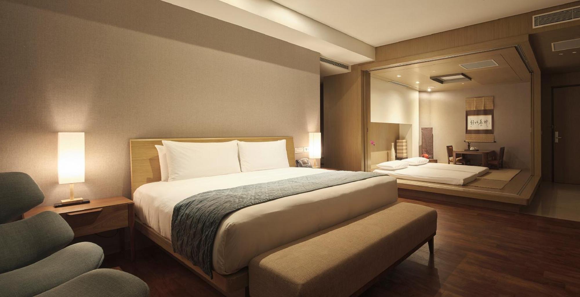 Fleur De Chine Hotel Yuchi Quarto foto A room at the hotel