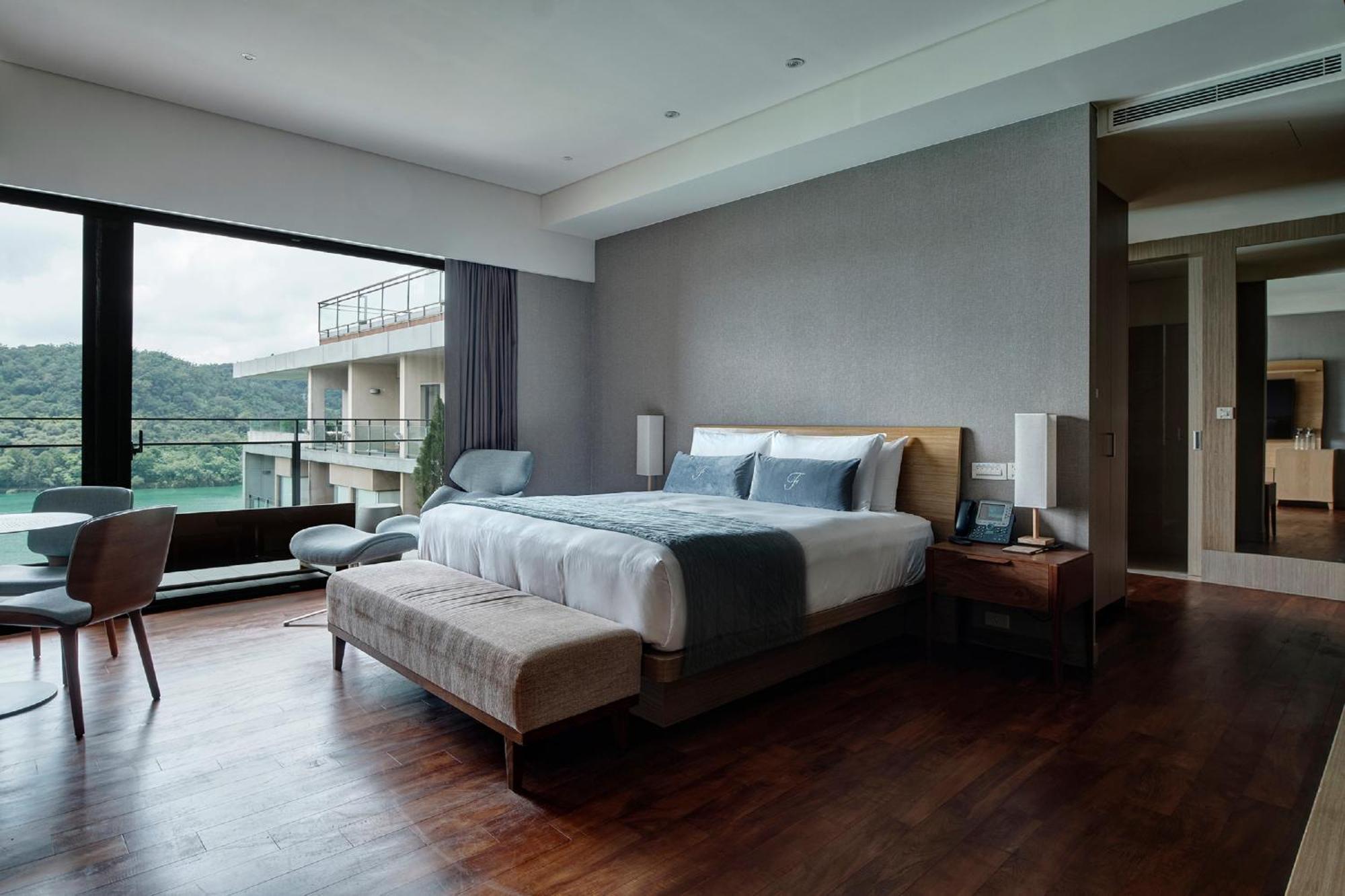 Fleur De Chine Hotel Yuchi Exterior foto A bedroom at the hotel