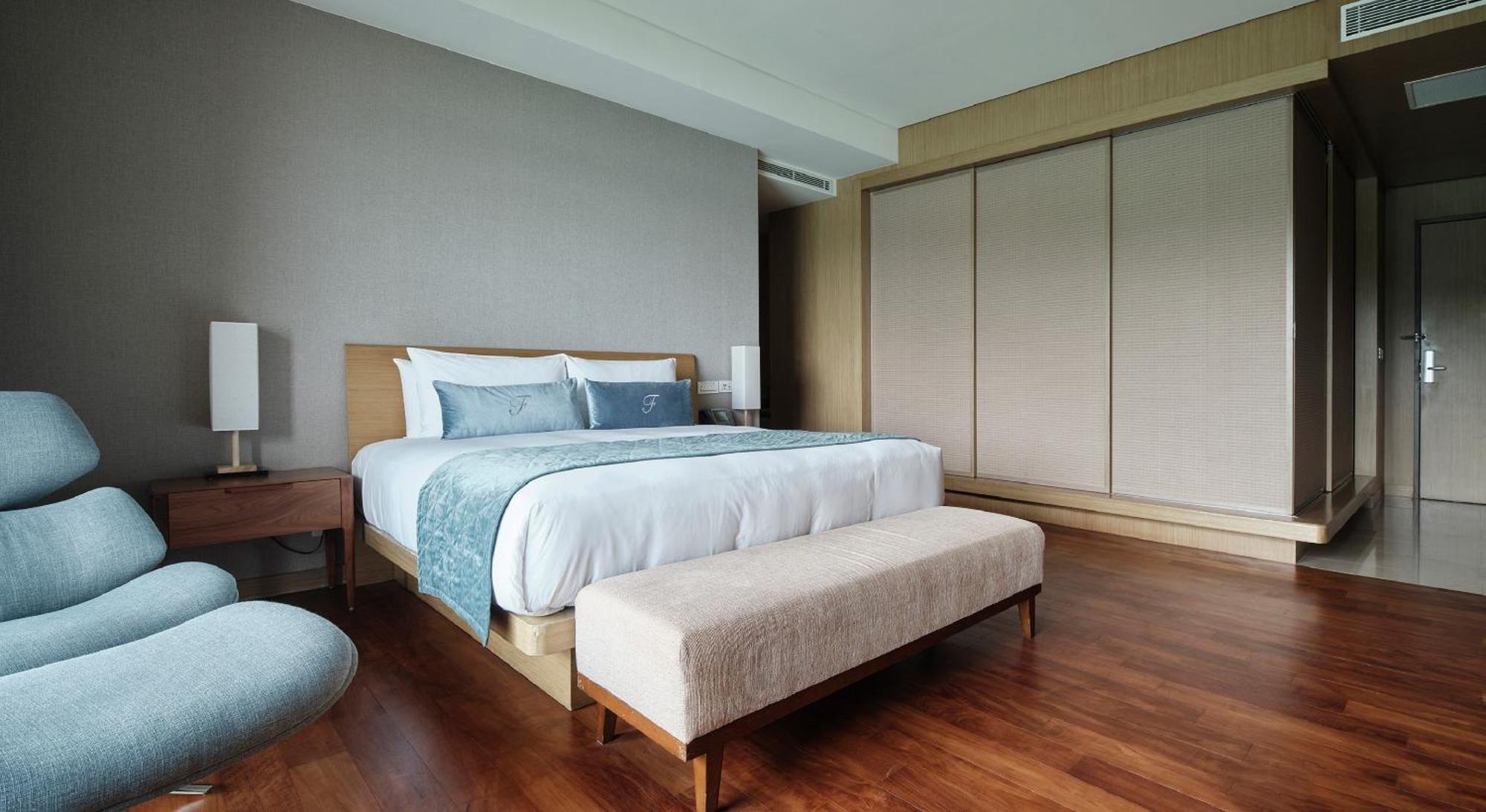 Fleur De Chine Hotel Yuchi Quarto foto A bedroom at the hotel