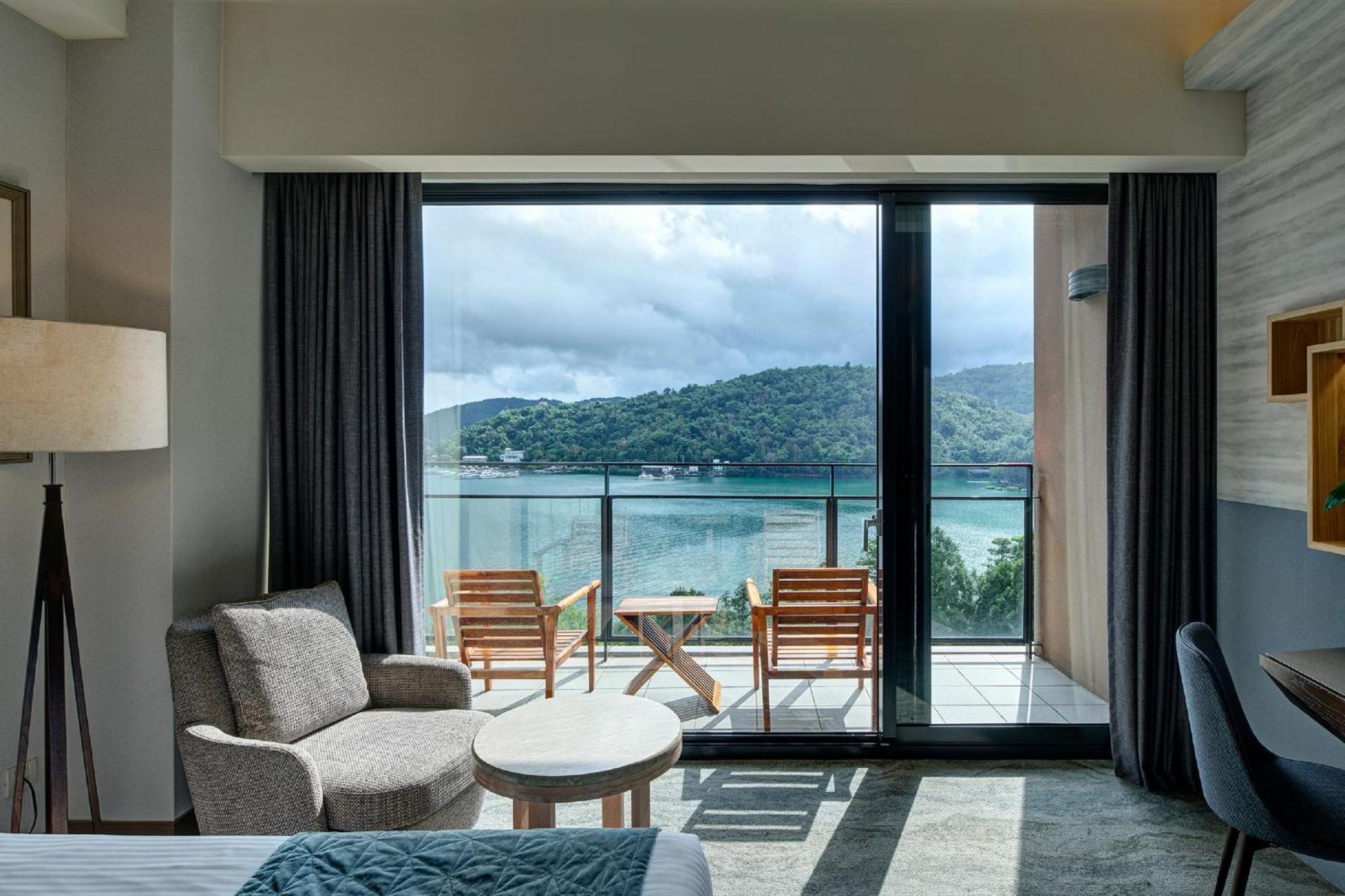 Fleur De Chine Hotel Yuchi Quarto foto Deluxe Ocean View