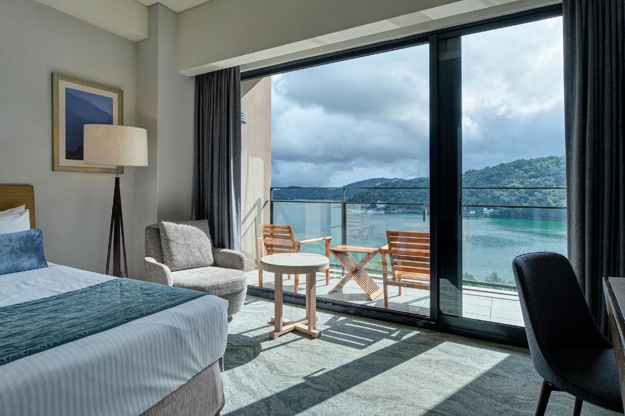 Fleur De Chine Hotel Yuchi Quarto foto A guest room at the hotel