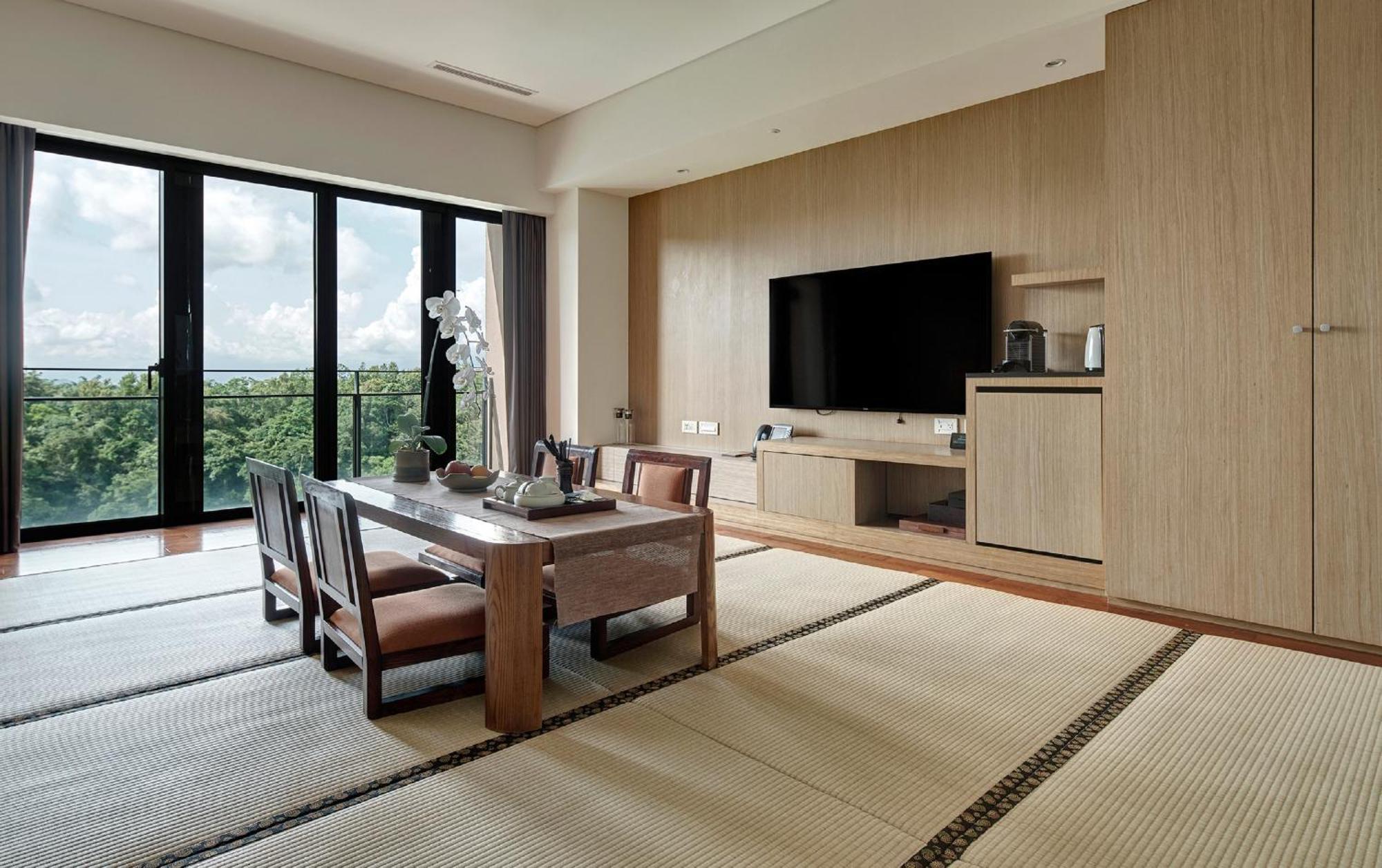 Fleur De Chine Hotel Yuchi Exterior foto A living room with a tatami floor