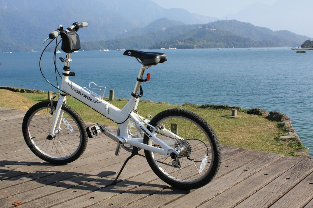Fleur De Chine Hotel Yuchi Exterior foto A folding bicycle